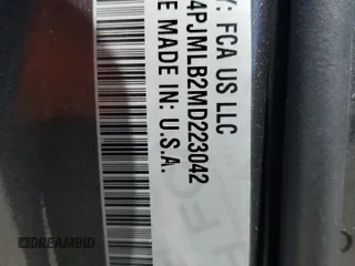 2021 Jeep Cherokee Latitude Plus z VIN 1C4PJMLB2MD223042, wystawiony jako Copart lot #64071115 z przebiegiem 48 698 mil mil oraz Szkoda całkowita • Salvage title. Historia ofert i sprzedaży dostępna na DreamBid. Obrazek 14.