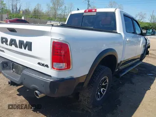 2018 Ram 1500 Rebel with VIN 1C6RR7YT3JS133384, listed as a IAAI auction lot 42097247 with 77,621 mi miles and . Bid and sale history available at DreamBid. Image 4.