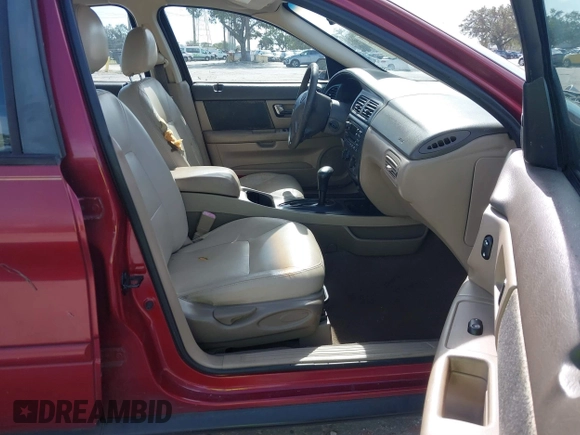 2002 Ford Taurus SES Standard with VIN 1FAFP55S42A135871, listed as a IAAI auction lot 40822596 with 185,605 mi miles. Bid and sale history available at carsss.com. Image 5.