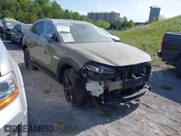 2024 Mazda CX-30 Carbon Edition with VIN 3MVDMBXY6RM649856, listed as a IAAI auction lot 41488913 with 7,350 mi miles and . Bid and sale history available at DreamBid. Image 1.
