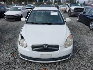 2006 Hyundai Accent GLS with VIN KMHCN46C36U009036, listed as a IAAI auction lot 41705369 with 134,328 mi miles. Bid and sale history available at carsss.com. Image 12.