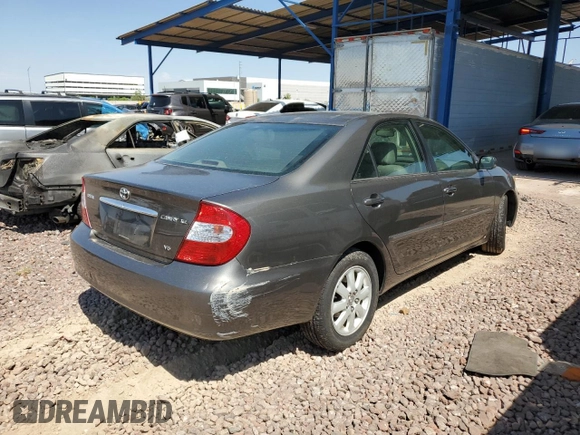 2004 Toyota Camry LE with VIN 4T1BF30K24U569209, listed as a Copart auction lot 66181644 with 186,412 mi miles and Salvage Title. Bid and sale history available at carsss.com. Image 3.