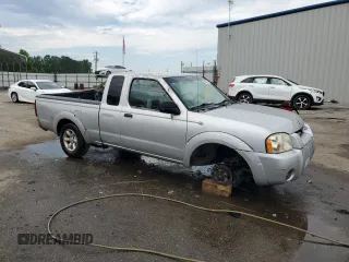 2004 Nissan Frontier XE with VIN 1N6DD26T54C460839, listed as a Copart auction lot 56355795 with 321,540 mi miles and Salvage title. Bid and sale history available at DreamBid. Image 4.