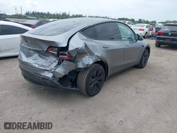 2025 Tesla Model Y Long Range with VIN 7SAYGDED5SF257258, listed as a IAAI auction lot 41877196 with 4,442 mi miles and . Bid and sale history available at DreamBid. Image 4.