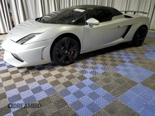 2013 Lamborghini Gallardo z VIN ZHWGU6BZ7DLA12811, wystawiony jako Copart lot #51696395 z przebiegiem 35 389 mil mil oraz Szkody całkowita. Historia ofert i sprzedaży dostępna na DreamBid. Obrazek 1.