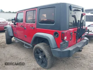 2008 Jeep Wrangler Unlimited X with VIN 1J4GA39138L550936, listed as a IAAI auction lot 41333939 with 181,936 mi miles and . Bid and sale history available at DreamBid. Image 3.