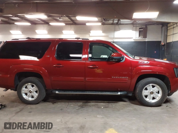2010 Chevrolet Suburban LT z VIN 1GNUKJE32AR106197, wystawiony jako IAAI lot #42378134 z przebiegiem 106 479 mil mil oraz . Historia ofert i sprzedaży dostępna na DreamBid. Obrazek 14.