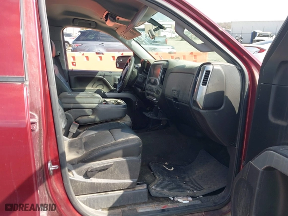 2016 Chevrolet Silverado 1500 LT with VIN 3GCUKREC0GG354271, listed as a IAAI auction lot 38948207 with 130,369 mi miles. Bid and sale history available at carsss.com. Image 5.