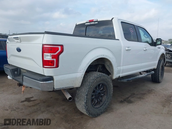 2019 Ford F-150 XL with VIN 1FTEW1E51KKC41183, listed as a IAAI auction lot 42049732 with 113,451 mi miles and . Bid and sale history available at DreamBid. Image 4.