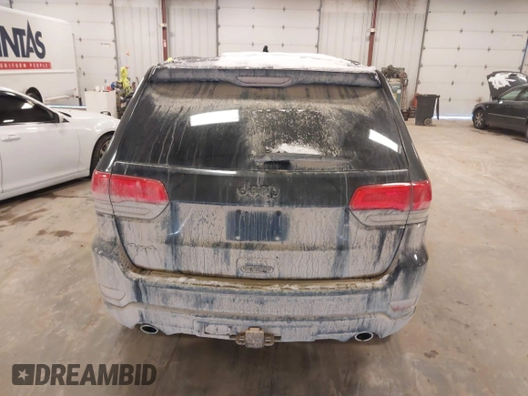 2015 Jeep Grand Cherokee Laredo with VIN 1C4RJFAG3FC607827, listed as a IAAI auction lot 41298397 with 198,171 mi miles. Bid and sale history available at carsss.com. Image 16.