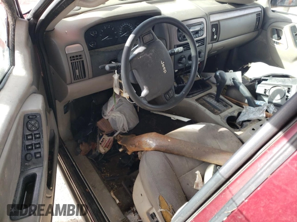 2002 Jeep Grand Cherokee Laredo с VIN 1J4GX48S02C257582, выставлен на аукционе Copart как лот 88787515 с пробегом Не указан миль и Списание • Salvage title. История ставок и продаж доступна на DreamBid. Изображение 8.