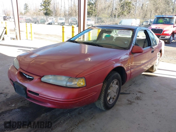 1997 Ford Thunderbird LX with VIN 1FALP6247VH138208, listed as a IAAI auction lot 41562980 with 135,204 mi miles and . Bid and sale history available at DreamBid. Image 2.