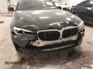 2021 BMW 5 Series 530i xDrive with VIN WBA13BJ09MCF64918, listed as a IAAI auction lot 41749529 with 90,076 mi miles and . Bid and sale history available at carsss.com. Image 6.