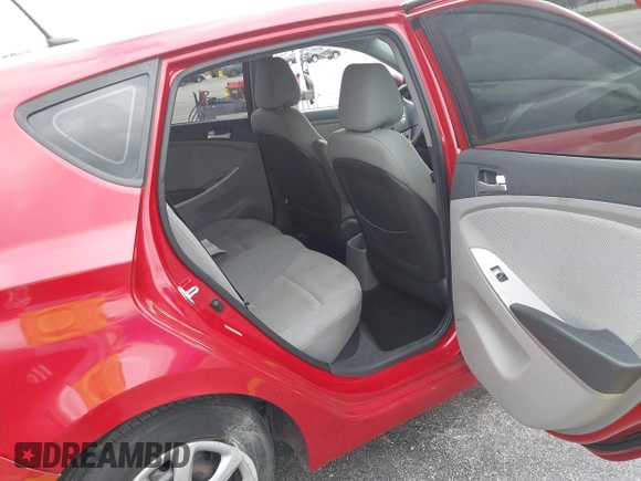 2013 Hyundai Accent GS z VIN KMHCT5AE2DU123126, wystawiony jako IAAI lot #40902043 z przebiegiem 97 822 mil mil oraz . Historia ofert i sprzedaży dostępna na DreamBid. Obrazek 8.