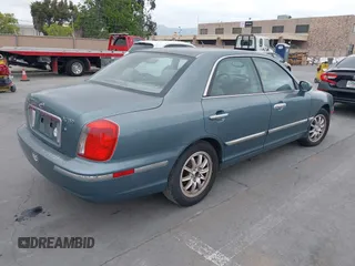 2004 Hyundai XG with VIN KMHFU45E24A363583, listed as a IAAI auction lot 42131410 with 151,476 mi miles. Bid and sale history available at carsss.com. Image 4.