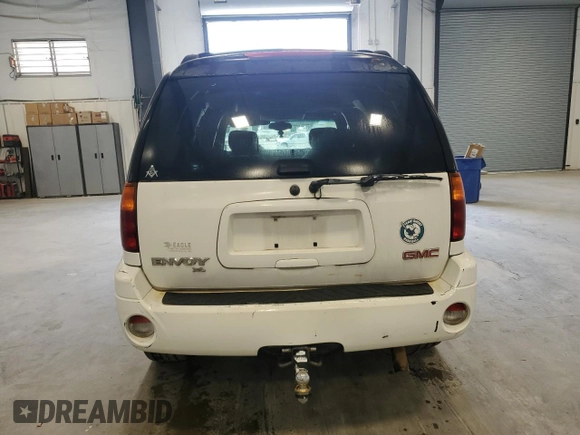 2003 GMC Envoy SLT with VIN 1GKES16S436240107, listed as a Copart auction lot 52327005 with 237,745 mi miles and Clean Title. Bid and sale history available at carsss.com. Image 6.