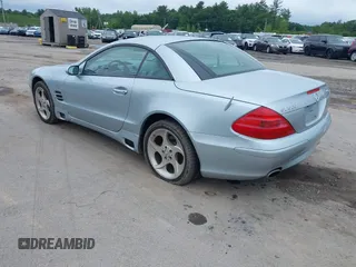 2004 Mercedes-Benz SL 500 with VIN WDBSK75F54F067493, listed as a IAAI auction lot 42548735 with 1,522 mi miles and . Bid and sale history available at DreamBid. Image 3.