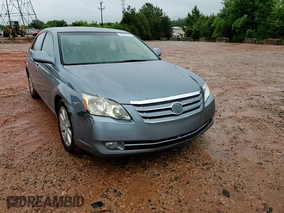 2005 Toyota Avalon XL z VIN 4T1BK36B65U041287, wystawiony jako Copart lot #56566535 z przebiegiem 223 562 mil mil oraz Szkoda całkowita • Salvage title. Historia ofert i sprzedaży dostępna na DreamBid. Obrazek 13.