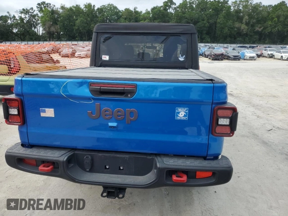 2022 Jeep Gladiator Rubicon with VIN 1C6JJTBG4NL111323, listed as a Copart auction lot 58772405 with 25,997 mi miles and Salvage title. Bid and sale history available at DreamBid. Image 6.