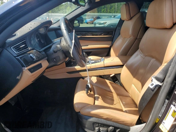 2012 BMW 7 Series 750Li с VIN WBAKB8C56CDX21023, выставлен на аукционе Copart как лот 61988955 с пробегом 145 022 миль миль и Списание • Salvage title. История ставок и продаж доступна на DreamBid. Изображение 7.