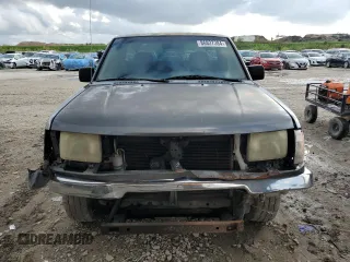 2000 Nissan Frontier XE z VIN 1N6DD21S8YC430562, wystawiony jako Copart lot #86827384 z przebiegiem Nie podano mil oraz Szkoda całkowita • Salvage title. Historia ofert i sprzedaży dostępna na DreamBid. Obrazek 5.