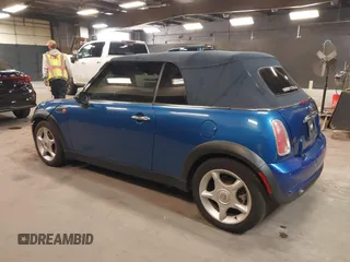 2005 MINI Convertible with VIN WMWRF33555TF63632, listed as a IAAI auction lot 42166640 with 102,559 mi miles and . Bid and sale history available at DreamBid. Image 3.