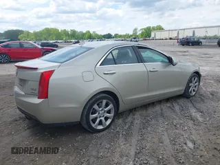2014 Cadillac ATS Standard AWD with VIN 1G6AG5RXXE0104616, listed as a IAAI auction lot 42353317 with 123,169 mi miles and . Bid and sale history available at DreamBid. Image 4.