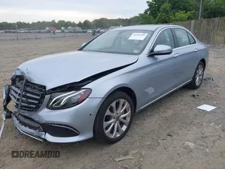 2018 Mercedes-Benz E 300 with VIN WDDZF4KB3JA385504, listed as a IAAI auction lot 42340289 with 15,336 mi miles and . Bid and sale history available at DreamBid. Image 2.