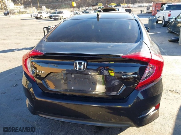 2016 Honda Civic Sedan Touring with VIN 19XFC1F99GE206092, listed as a IAAI auction lot 41031121 with 133,682 mi miles. Bid and sale history available at carsss.com. Image 16.