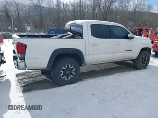 2019 Toyota Tacoma SR z VIN 5TFCZ5AN9KX178090, wystawiony jako IAAI lot #41155337 z przebiegiem 115 265 mil mil oraz . Historia ofert i sprzedaży dostępna na DreamBid. Obrazek 4.