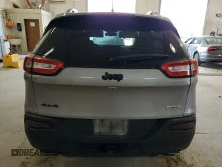 2016 Jeep Cherokee Latitude with VIN 1C4PJMCSXGW180482, listed as a Copart auction lot 60639315 with 118,164 mi miles and Salvage title. Bid and sale history available at DreamBid. Image 6.