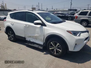 2018 Toyota RAV4 XLE with VIN JTMWFREVXJD118021, listed as a Copart auction lot 58845805 with 108,068 mi miles and Salvage title. Bid and sale history available at DreamBid. Image 4.