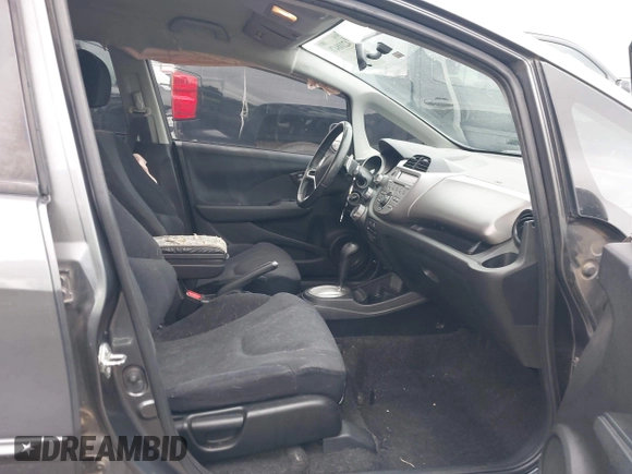 2011 Honda Fit Sport z VIN JHMGE8H51BC003715, wystawiony jako IAAI lot #42108476 z przebiegiem 174 228 mil mil oraz . Historia ofert i sprzedaży dostępna na DreamBid. Obrazek 5.