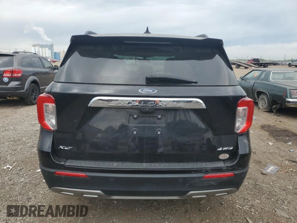 2023 Ford Explorer XLT with VIN 1FMSK8DH3PGA58229, listed as a Copart auction lot 58571525 with 64,536 mi miles and Salvage title. Bid and sale history available at DreamBid. Image 6.