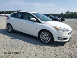 2015 Ford Focus Titanium с VIN 1FADP3N24FL214429, выставлен на аукционе Copart как лот 59159075 с пробегом 157 353 миль миль и Списание • Salvage title. История ставок и продаж доступна на DreamBid. Изображение 4.