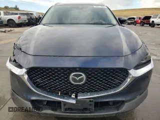 2023 Mazda CX-30 Premium Plus with VIN 3MVDMBEY9PM500907, listed as a Copart auction lot 70871494 with 38,599 mi miles and Salvage title. Bid and sale history available at DreamBid. Image 5.