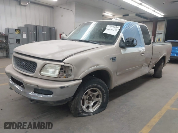 1998 Ford F-150 with VIN 1FTZX18W6WKA83626, listed as a IAAI auction lot 40625179 with 343,403 mi miles and . Bid and sale history available at DreamBid. Image 2.