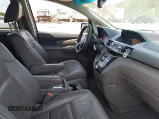 2012 Honda Odyssey EX-L with VIN 5FNRL5H63CB037697, listed as a IAAI auction lot 42262596 with 135,218 mi miles and . Bid and sale history available at DreamBid. Image 5.