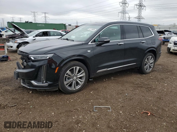 2022 Cadillac XT6 Premium Luxury z VIN 1GYKPFRS9NZ103281, wystawiony jako Copart lot #55118485 z przebiegiem 52 413 mil mil oraz Szkoda całkowita • Salvage title. Historia ofert i sprzedaży dostępna na DreamBid. Obrazek 1.