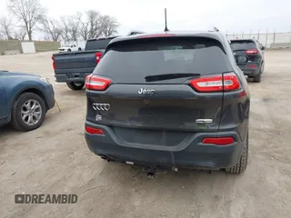 2016 Jeep Cherokee 75th Anniversary with VIN 1C4PJLCB1GW190344, listed as a IAAI auction lot 41951042 with 90,814 mi miles. Bid and sale history available at carsss.com. Image 17.