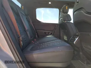 2022 Rivian R1T Adventure z VIN 7FCTGAAAXNN014983, wystawiony jako Copart lot #48987605 z przebiegiem Nie podano mil oraz Szkoda całkowita • Salvage title. Historia ofert i sprzedaży dostępna na DreamBid. Obrazek 10.