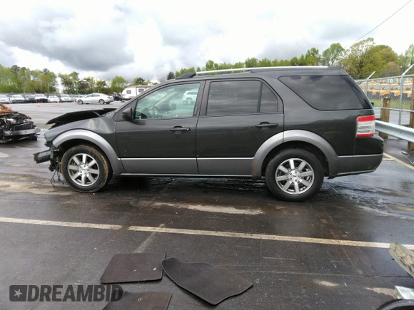 2008 Ford Taurus X SEL z VIN 1FMDK02W08GA28649, wystawiony jako IAAI lot #42026925 z przebiegiem 191 857 mil mil oraz . Historia ofert i sprzedaży dostępna na DreamBid. Obrazek 15.