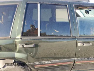 1995 Jeep Grand Cherokee Limited with VIN 1J4GZ78Y7SC730118, listed as a Copart auction lot 76031964 with 184,074 mi miles and Salvage Title. Bid and sale history available at carsss.com. Image 11.