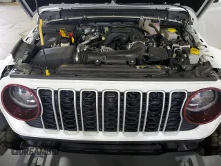 2024 Jeep Wrangler Sahara with VIN 1C4PJXEG8RW354580, listed as a Copart auction lot 64086715 with 11,721 mi miles and Salvage title. Bid and sale history available at DreamBid. Image 12.
