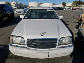 1995 Mercedes-Benz S 320 with VIN WDBGA32E8SA252144, listed as a Copart auction lot 77053484 with 126,534 mi miles and Clean Title. Bid and sale history available at DreamBid. Image 5.