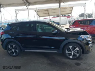 2017 Hyundai Tucson Value with VIN KM8J33A28HU484898, listed as a IAAI auction lot 41847105 with 53,210 mi miles. Bid and sale history available at carsss.com. Image 13.