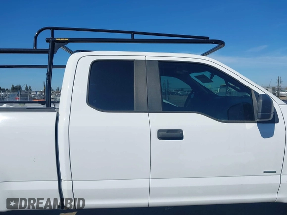 2017 Ford F-150 XL with VIN 1FTEX1CG2HKC93299, listed as a IAAI auction lot 41675673 with 101,726 mi miles. Bid and sale history available at carsss.com. Image 13.
