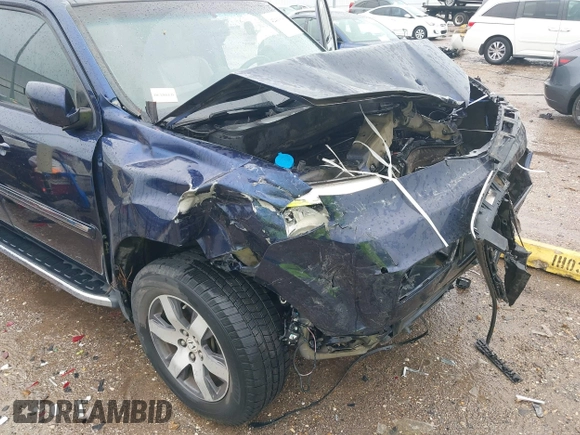 2013 Honda Pilot Touring with VIN 5FNYF4H95DB007125, listed as a IAAI auction lot 42493693 with Not provided miles and . Bid and sale history available at DreamBid. Image 19.