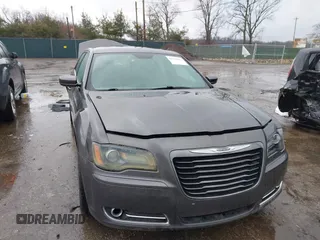 2014 Chrysler 300 with VIN 2C3CCABG7EH347031, listed as a IAAI auction lot 41711667 with 67,826 mi miles. Bid and sale history available at carsss.com. Image 1.