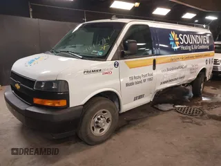 2020 Chevrolet Express Cargo Van with VIN 1GCWGBFB4L1205443, listed as a IAAI auction lot 41612714 with 87,883 mi miles. Bid and sale history available at carsss.com. Image 2.